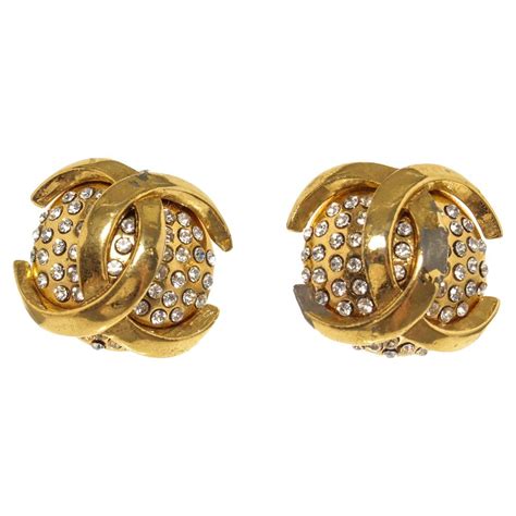 chanel women's metallic rhinestone gold-tone chain border cc clip-on earrings|chanel crochet earrings.